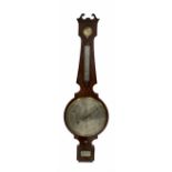A mid-Victorian four dial mercury wheel barometer in a mahogany veneered case