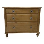 Victorian pine chest fitted with three long graduated drawers flanked by applied split turned pilast