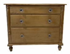 Victorian pine chest fitted with three long graduated drawers flanked by applied split turned pilast