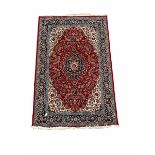 Persian Mashad red ground rug