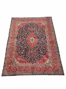 Fine hand Knotted Persian Kashan red and blue ground carpet