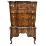 Queen Anne style walnut serpentine chest on stand