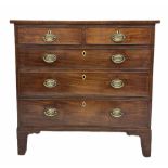 George III mahogany chest fitted with two short and three long cock beaded drawers with plate brass