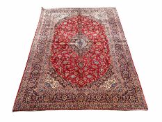 Large Kashan red ground carpet