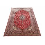 Large Kashan red ground carpet