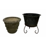 Composition stone urn planter decorated with swags