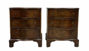 Small pair late 20th century mahogany serpentine chests