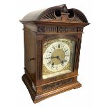 Late 19th century striking mantle clock in architectural walnut case