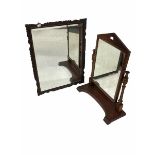 19th century dressing swing mirror with arched pediment over turned and fluted supports on a shaped