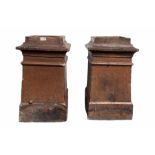 Pair of 19th century salt glazed chimney pots of square tapered form H59cm