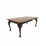 Early 20th century mahogany wind out extending dining table