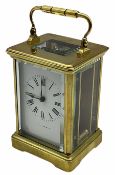 A 20th century Corniche cased 8-day timepiece carriage clock with a seven jewelled lever platform es