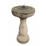 Sun dial on a composition baluster pedestal decorated with berries and vines H75cm