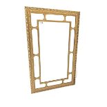 Ornate gilt framed wall mirror with beaded border and scrolled acanthus leaf decoration to frame 53