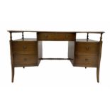 Mid 20th century mahogany serpentine front desk by 'Strongbow furniture'