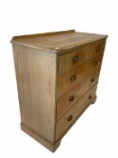 Late Victorian pine chest fitted with two short and three long graduated drawers