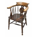 Late Victorian oak smokers bow armchair