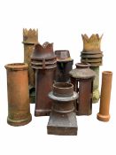 Eight salt glazed and other chimney pots of various forms