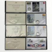 Four silver coin covers