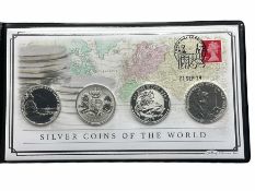 Coin cover containing four fine silver coins