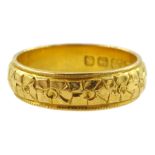 22ct gold wedding band with flower decoration