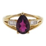 9ct gold pear shaped garnet and baguette diamond ring