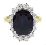 18ct gold oval sapphire and round brilliant cut diamond cluster ring