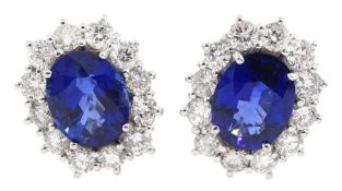 Pair of 18ct white god fine Ceylon sapphire and round brilliant cut diamond cluster stud earrings