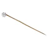 Gold mounted single stone diamond stick pin