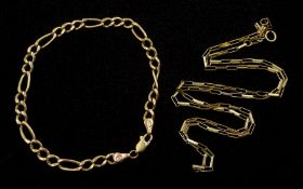 Gold rectangular link necklace and a gold Figaro link bracelet