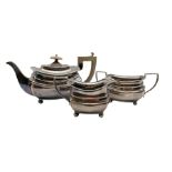 Silver three piece tea set of rectangular form with gadrooned edge and ball feet Birmingham 1930 Mak