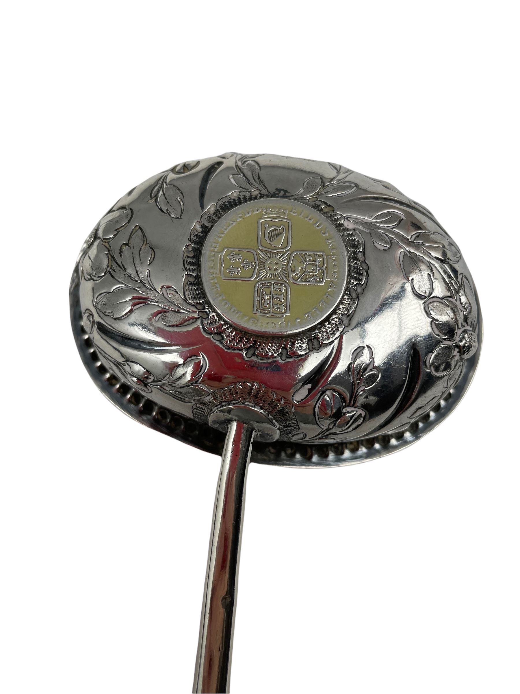 George III silver punch ladle with later embossed oval bowl inset with a silver shilling and with tw - Image 3 of 3
