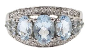 9ct white gold oval blue topaz and diamond ring