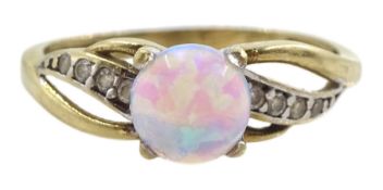 Gold opal ring with cubic zirconia shoulders