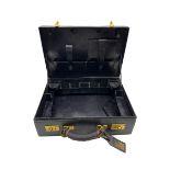 An early 20th century French leather travelling fitted vanity case