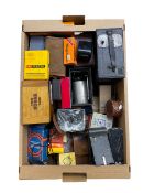 Collection of vintage camera equipment including Kodak Vest Pocket camera