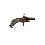 Miniature nickel .22 pin fire single shot pistol with engraved grip and suspension ring to the butt