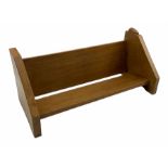 Oak 'Rabbitman' book trough by Peter Heap of Wetwang with carved rabbit signature L49cm