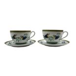 Pair of Hermes Toucan decorated cups and saucers