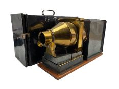 Magic lantern with brass lens in metal case