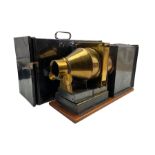 Magic lantern with brass lens in metal case