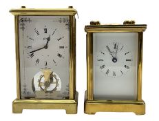 An English eight-day timepiece carriage clock in a Corniche styled case