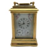 A contemporary miniature carriage clock with Sevres style porcelain panels