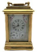 A contemporary miniature carriage clock with Sevres style porcelain panels