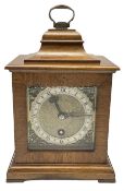 A small mid-20th century mantle clock in the style of an 18th century bracket clock