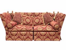 A large Knole drop arm two seater sofa