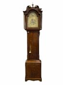 An oak longcase clock with an associated dial and movement