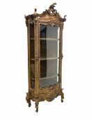 19th century French giltwood and gesso vitrine display cabinet in the rococo taste