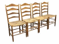 Set four 19th century oak ladder back dining chairs