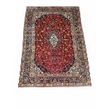 Persian Kashan red ground rug